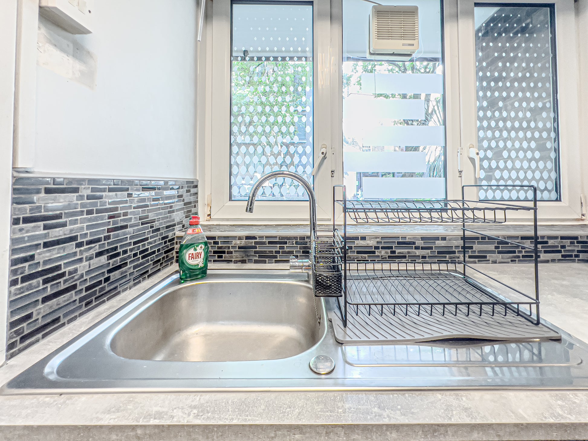 kitchen sink of an airbnb property icentral london